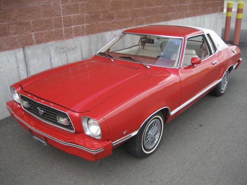 Bright Red 78 Mustang II Ghia Coupe with White Vinyl Roof