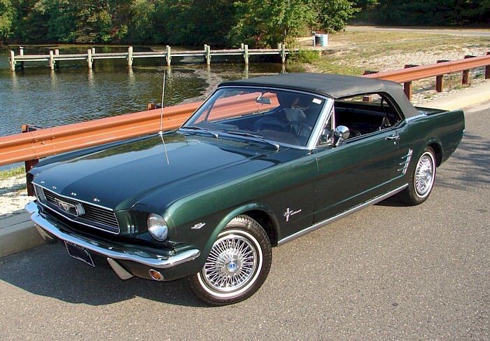 Ivy Green 1966 Mustang convertible with top up