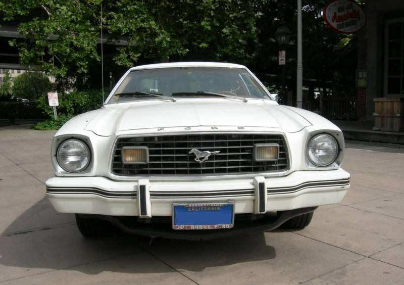 White 78 Mustang Ghia Chamois Vinyl Hardtop