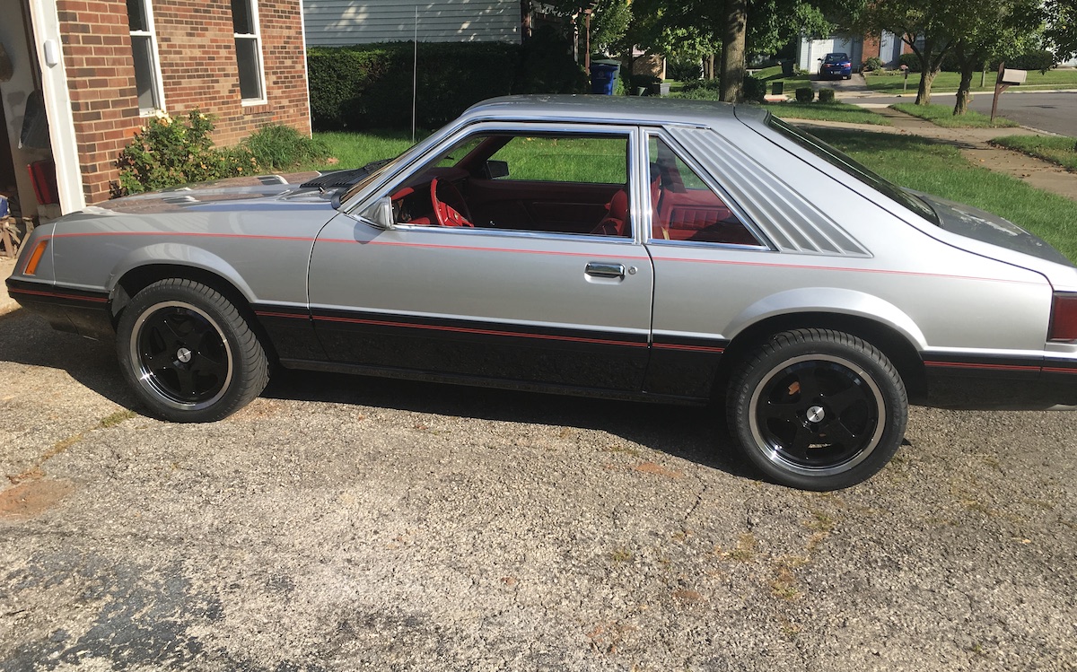 Silver and black 1979 Mustang hatchback