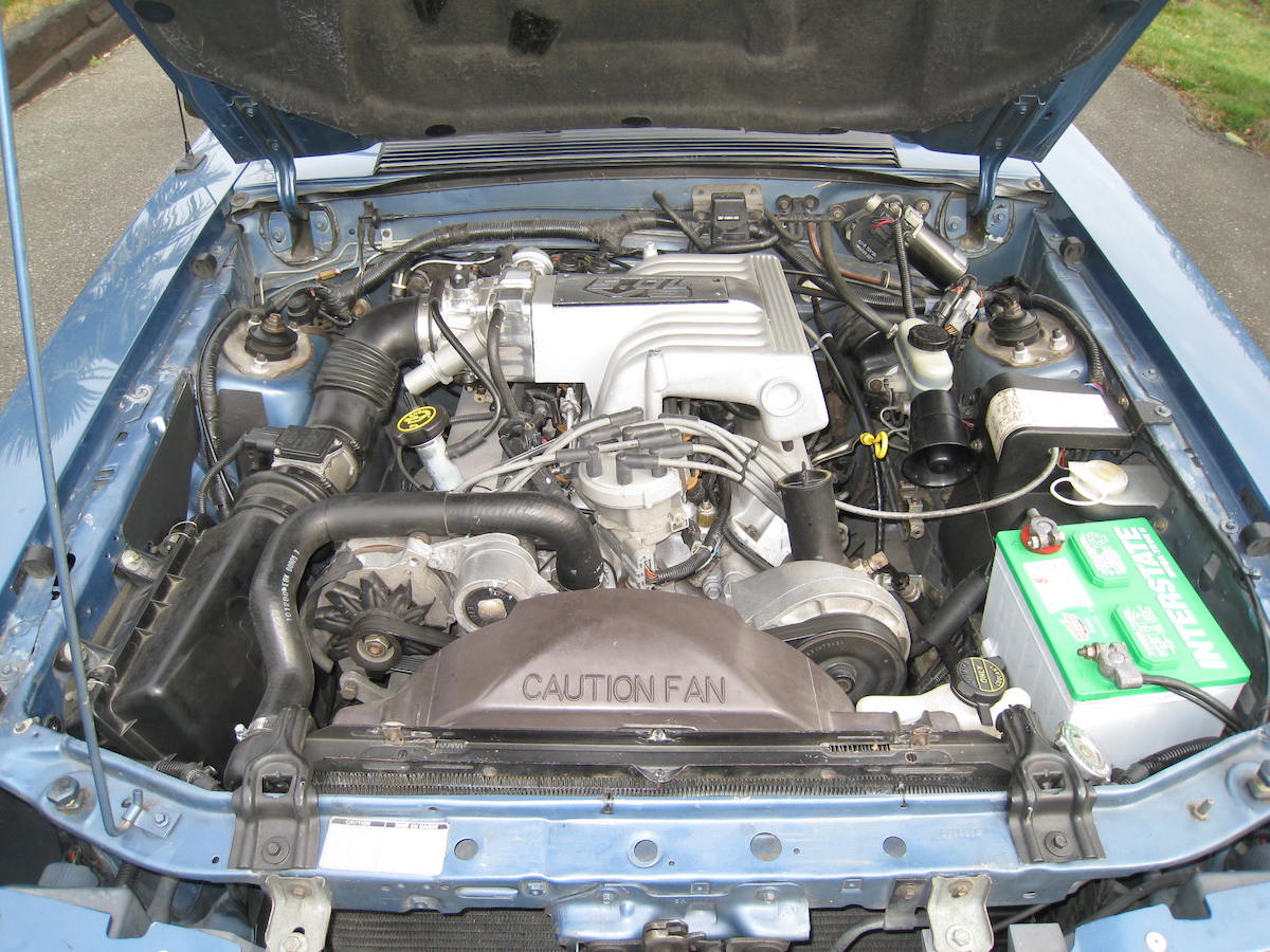 5.0L V8 engine with upgraded manifold