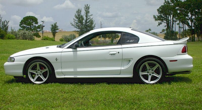 This car has pinstripes and 18 inch Saleen replica wheels. 