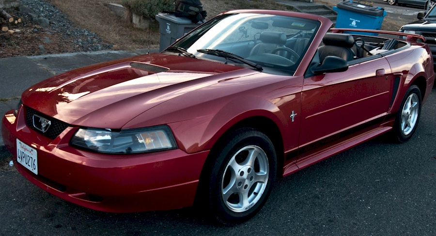 Laser Red 2002 Mustang Convertible. 