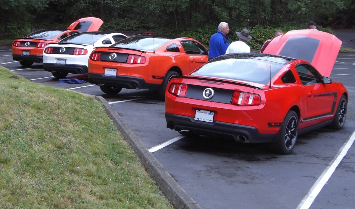 Red Orange and White 2012 Boss 302 Mustangs